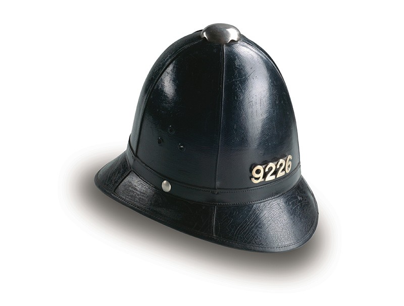 Photo of old Black Bobby police helmet from 1877