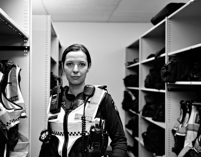 Photo of contemporary policewoman in uniform 